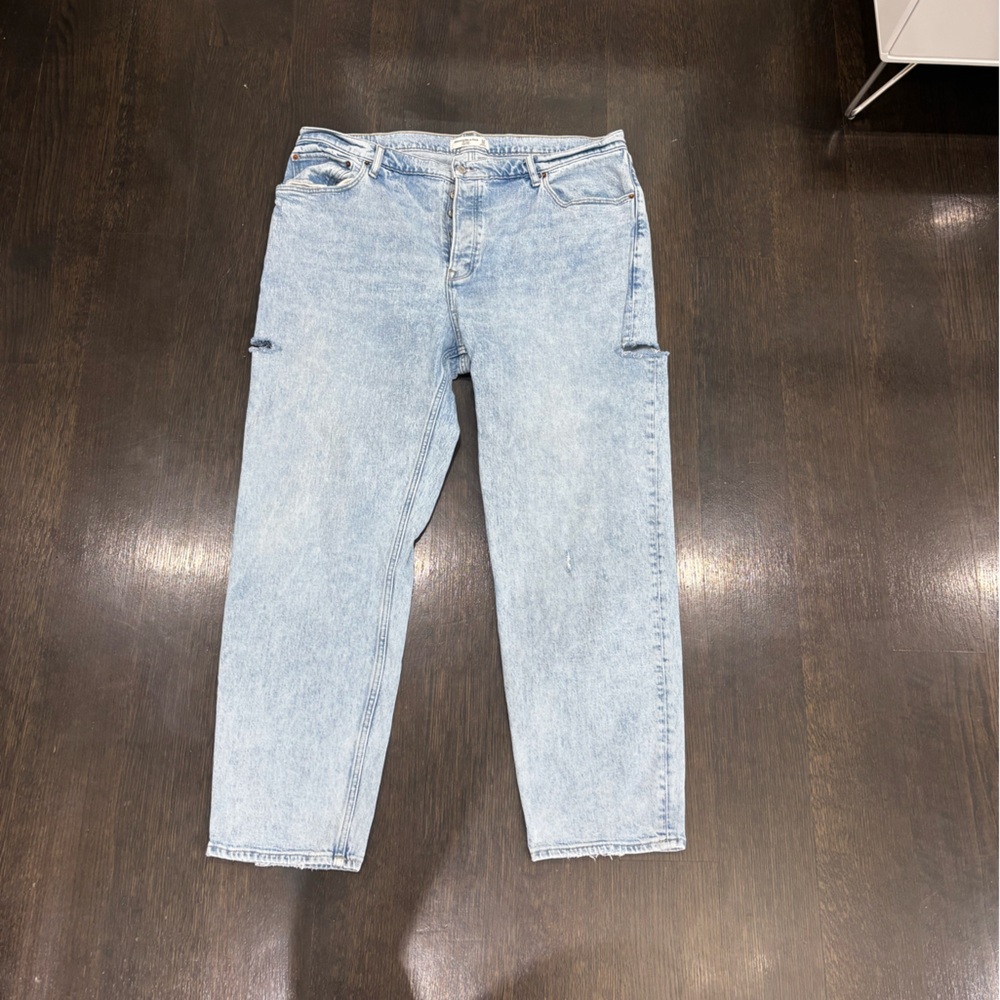 Abercrombie jeans with slits at side of each thigh. Button up to close.